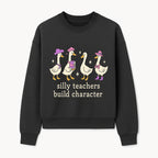 Silly Teachers Build Character - Cute Duck Illustration, Educational Gift, Fun Classroom Decor, Teacher Appreciation, Kids Learning - Sweatshirt 1758093387607.jpg