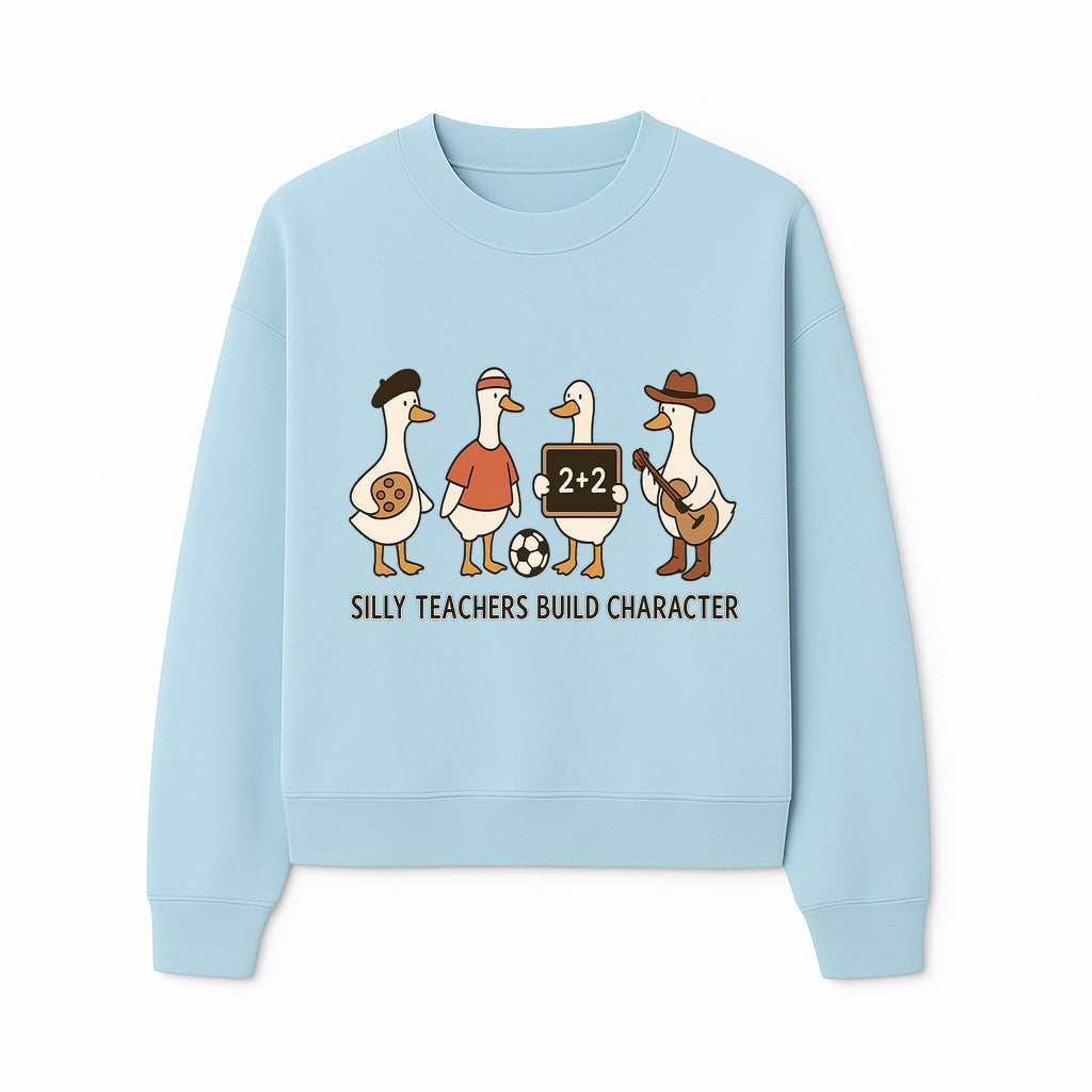 Silly Teachers Build Character Ducks Graphic Tee for Kids Fun Classroom Humor Shirt with Soccer, Music, and Learning Themes - Sweatshirt 1758093387671.jpg