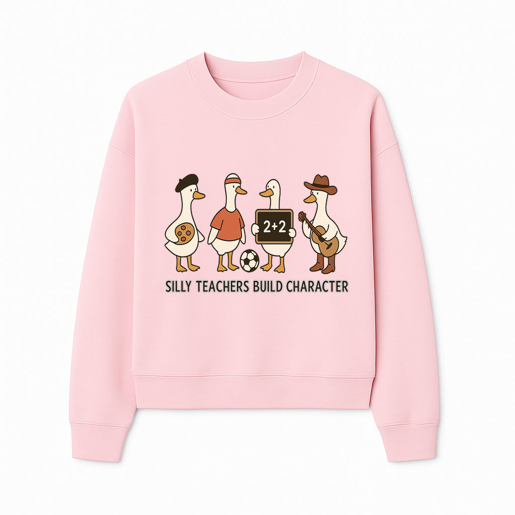 Silly Teachers Build Character Ducks Graphic Tee for Kids Fun Classroom Humor Shirt with Soccer, Music, and Learning Themes - Sweatshirt 1758093387798.jpg