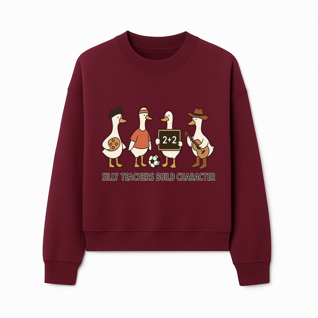 Silly Teachers Build Character Ducks Graphic Tee for Kids Fun Classroom Humor Shirt with Soccer, Music, and Learning Themes - Sweatshirt 1758093388001.jpg