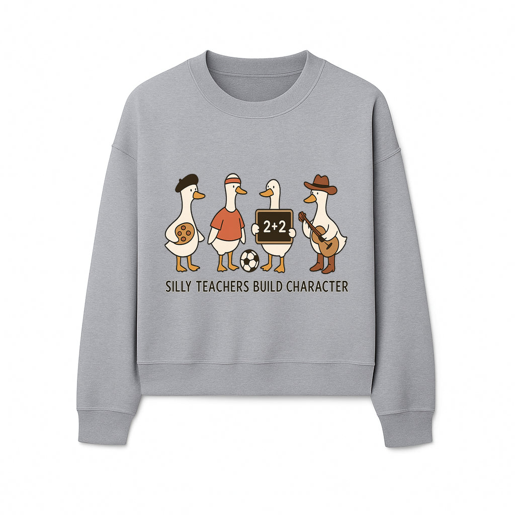 Silly Teachers Build Character Ducks Graphic Tee for Kids Fun Classroom Humor Shirt with Soccer, Music, and Learning Themes - Sweatshirt 1758093388480.jpg