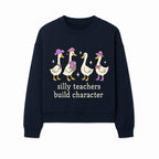 Silly Teachers Build Character - Cute Duck Illustration, Educational Gift, Fun Classroom Decor, Teacher Appreciation, Kids Learning - Sweatshirt 1758093388630.jpg
