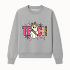 Halloween Ghost Teacher T-Shirt | Cute Ghost with Pencil | Fun Teaching Apparel | Spooky Season Gift for Educators - Sweatshirt 1758093388759.jpg