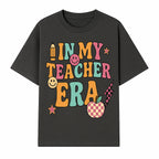 In My Teacher Era Graphic Tee - Retro Style with Happy Faces and School Elements, Perfect for Educators - T-shirt 1758093389018.jpg