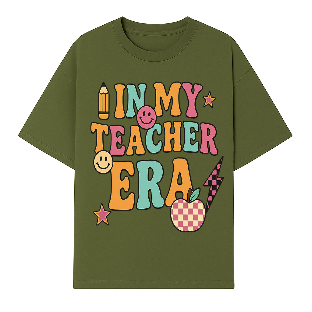 In My Teacher Era Graphic Tee - Retro Style with Happy Faces and School Elements, Perfect for Educators - T-shirt 1758093389179.jpg