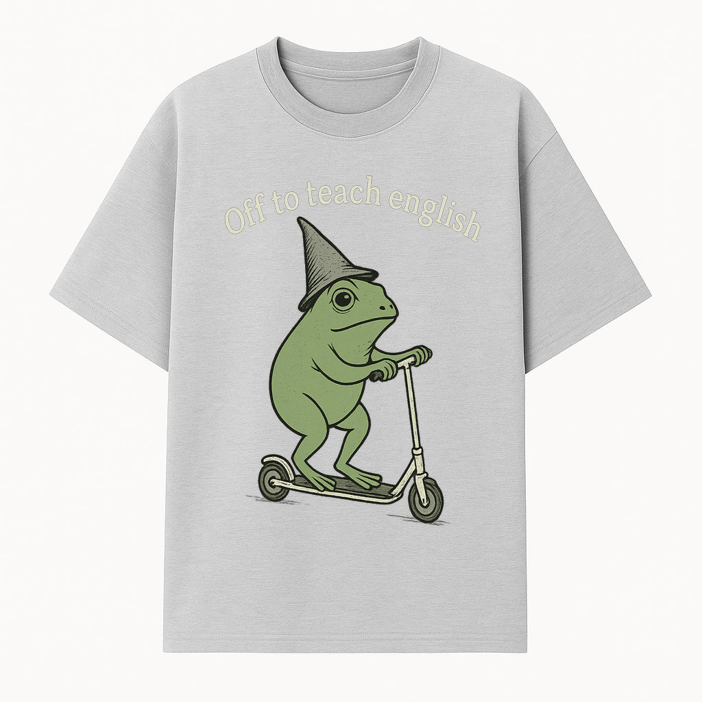 Funny Frog Scooting Off to Teach English T-Shirt, Cute Teacher Gift, Humorous Classroom Apparel, Whimsical Design for ESL Educators - T-shirt 1758093389564.jpg