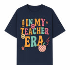 In My Teacher Era Graphic Tee - Retro Style with Happy Faces and School Elements, Perfect for Educators - T-shirt 1758093390087.jpg
