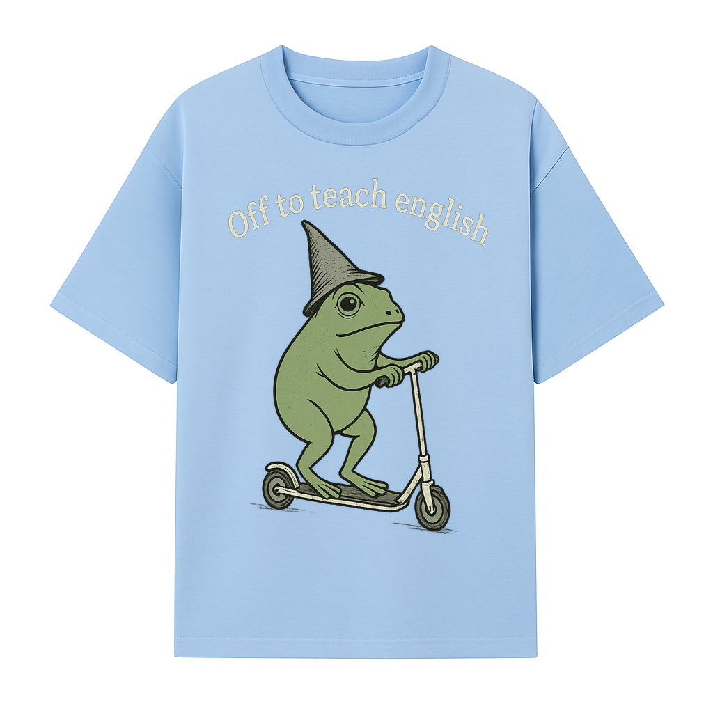 Funny Frog Scooting Off to Teach English T-Shirt, Cute Teacher Gift, Humorous Classroom Apparel, Whimsical Design for ESL Educators - T-shirt 1758093390429.jpg