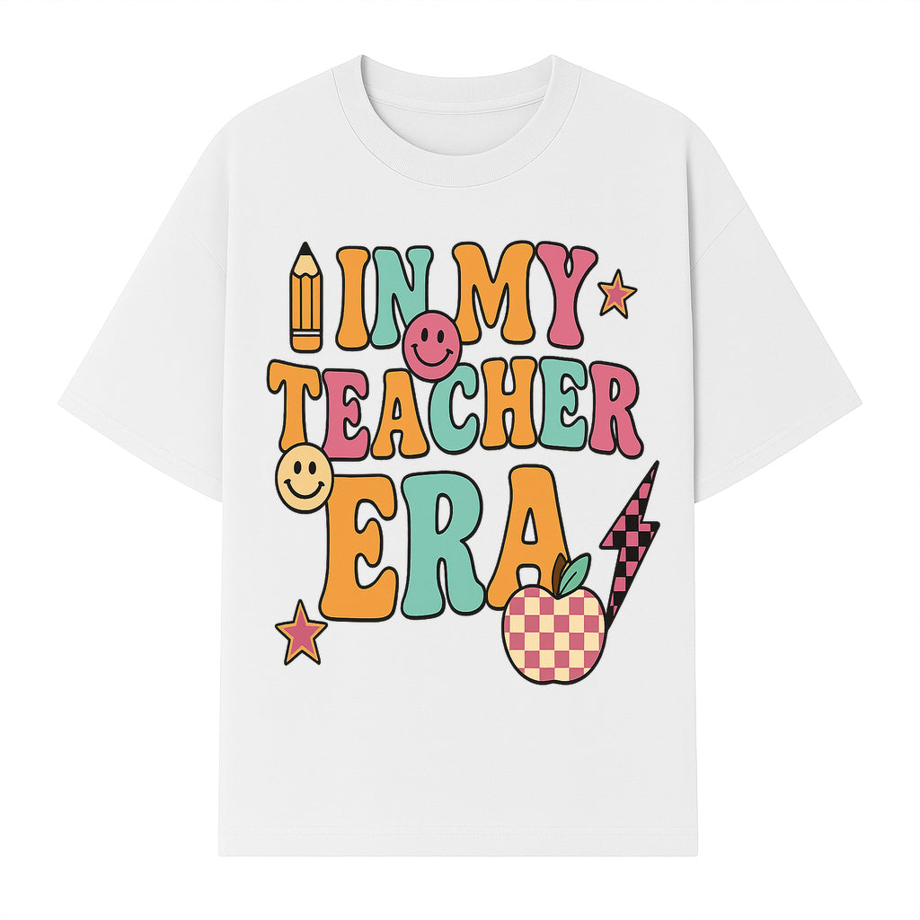 In My Teacher Era Graphic Tee - Retro Style with Happy Faces and School Elements, Perfect for Educators - T-shirt 1758093390624.jpg