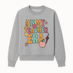 In My Teacher Era Graphic Tee - Retro Style with Happy Faces and School Elements, Perfect for Educators - Sweatshirt 1758093392122.jpg