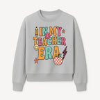 In My Teacher Era Graphic Tee - Retro Style with Happy Faces and School Elements, Perfect for Educators - Sweatshirt 1758093392795.jpg