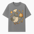 Chef Pigeon Serving Cake Design T-Shirt | Cute Bird Baking Graphic Tee | Fun Cooking Gift for Bird Lovers & Bakers - T-shirt 1758181727216.jpg