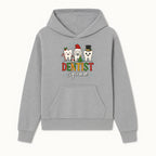 Cute Christmas Dentist Squad T-Shirt with Snowflakes, Toothy Characters, Penguin & Holiday Themes for Dental Professionals and Fans - Hoodie 1758250109105.jpg