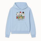 Cute Christmas Dentist Squad T-Shirt with Snowflakes, Toothy Characters, Penguin & Holiday Themes for Dental Professionals and Fans - Hoodie 1758250109245.jpg