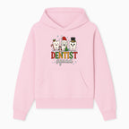 Cute Christmas Dentist Squad T-Shirt with Snowflakes, Toothy Characters, Penguin & Holiday Themes for Dental Professionals and Fans - Hoodie 1758250109446.jpg