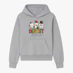 Cute Christmas Dentist Squad T-Shirt with Snowflakes, Toothy Characters, Penguin & Holiday Themes for Dental Professionals and Fans - Hoodie 1758250110094.jpg