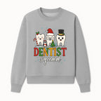 Cute Christmas Dentist Squad T-Shirt with Snowflakes, Toothy Characters, Penguin & Holiday Themes for Dental Professionals and Fans - Sweatshirt 1758250114684.jpg