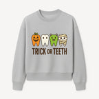 Cute Halloween Trick or Teeth Shirt with Pumpkin & Tooth Characters, Fun Kids' Costume Tee for Spooky Season - Sweatshirt 1758250119468.jpg