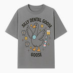 Silly Dental Goose Graphic Tee for Kids - Cute Toothbrush & Teeth Design, Fun Animal Apparel for Children's Dental Hygiene Awareness - T-shirt 1758250122929.jpg