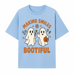 Cute Ghosts Halloween T-Shirt - Making Smiles Bootiful with Pumpkin & Flowers, Fun Fall Apparel for Kids & Adults - T-shirt 1758250143022.jpg