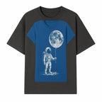 Astronaut Holding Moon Balloon T-Shirt | Space Themed Graphic Tee | Unique Gift for Sci-Fi Lovers and Dreamers - T-shirt 1758273094514.jpg