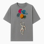 Astronaut with Planet Balloons T-Shirt | Space Themed Graphic Tee | Cute Outer Space Adventure Design for Kids & Adults - T-shirt 1758273101528.jpg