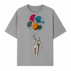 Astronaut with Planet Balloons T-Shirt | Space Themed Graphic Tee | Cute Outer Space Adventure Design for Kids & Adults - T-shirt 1758273102390.jpg