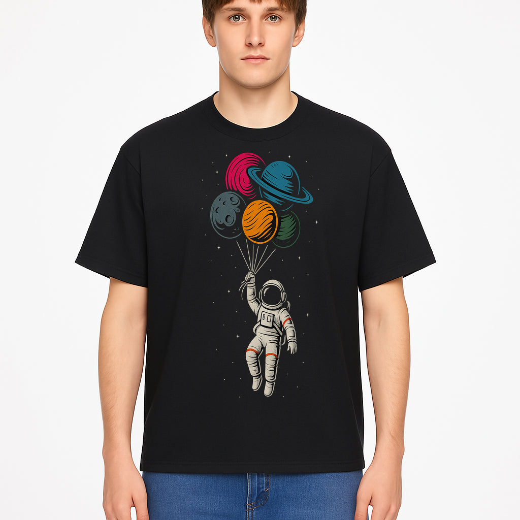 Astronaut with Planet Balloons T-Shirt | Space Themed Graphic Tee | Cute Outer Space Adventure Design for Kids & Adults - T-shirt 1758273103661.jpg