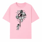 Astronaut Holding Planet Balloons Graphic T-Shirt | Space Adventure Design | Galaxy-Themed Apparel for Kids and Adults - T-shirt 1758273117680.jpg