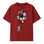 Astronaut Holding Planet Balloons Graphic T-Shirt | Space Adventure Design | Galaxy-Themed Apparel for Kids and Adults - T-shirt 1758273117891.jpg