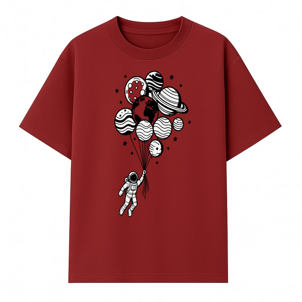 Astronaut Holding Planet Balloons Graphic T-Shirt | Space Adventure Design | Galaxy-Themed Apparel for Kids and Adults - T-shirt 1758273117891.jpg