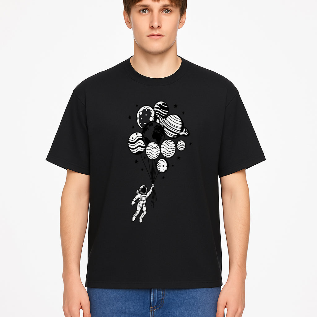 Astronaut Holding Planet Balloons Graphic T-Shirt | Space Adventure Design | Galaxy-Themed Apparel for Kids and Adults - T-shirt 1758273119595.jpg
