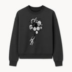 Astronaut Holding Planet Balloons Graphic T-Shirt | Space Adventure Design | Galaxy-Themed Apparel for Kids and Adults - Sweatshirt 1758273120183.jpg