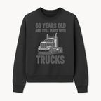 60th Birthday Truck Lover Shirt - Still Plays with Trucks - Vintage Humor Gift for Men - Sweatshirt 1758556400732.jpg