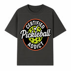 Certified Pickleball Addict T-Shirt | Pickleball Fan Apparel | Funny Sports Gift for Players | Green Paddle Ball Design - T-shirt 1758685032400.jpg