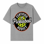 Certified Pickleball Addict T-Shirt | Pickleball Fan Apparel | Funny Sports Gift for Players | Green Paddle Ball Design - T-shirt 1758685033484.jpg