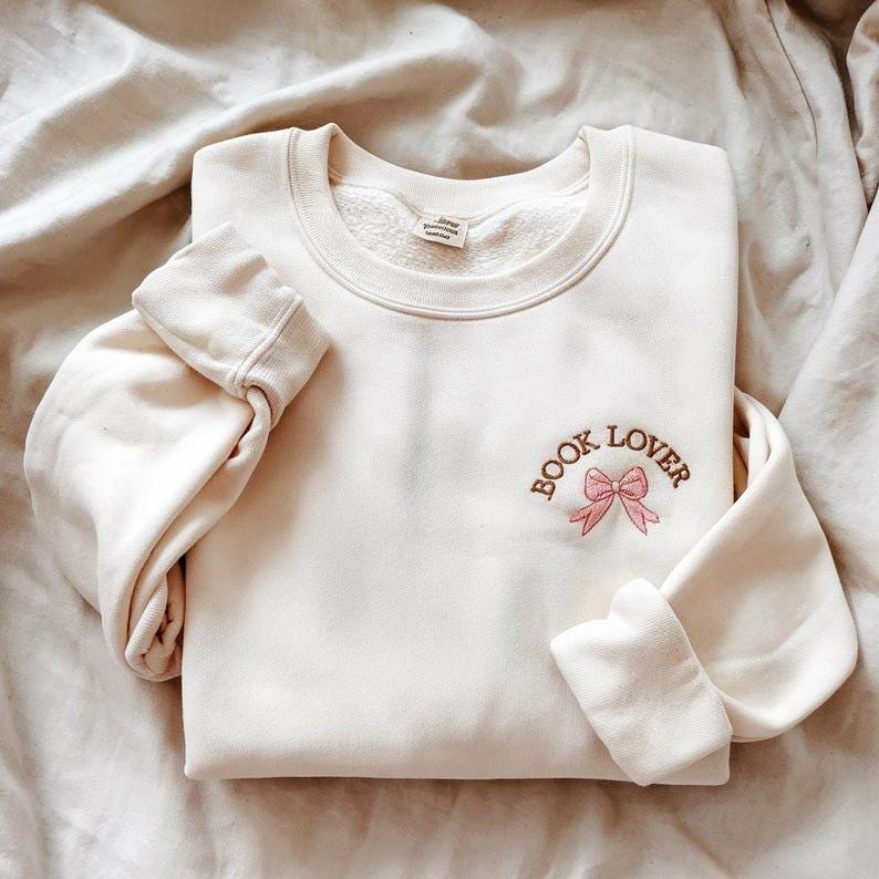 Embroidered Coquette Book Lover Sweatshirt Bow Bookish Sweatshirt Gift For Book Lovers Book Lover Hoodie Teacher Appreciation Hoodie 1759375869378.jpg