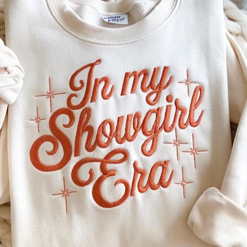 Embroidered Showgirl Era Sweatshirt Showgirl Life Sweater For Fan In My Showgirl Era Sweatshirt For Concert Podcast Hoodie Country Music Fan Hoodie 1759391997621.jpg
