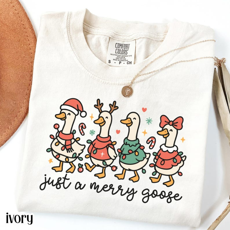 Christmas Comfort Colors Goose Shirt Funny Holiday Santa Lights Tshirt Festive Jolly Goose Tee Merry Christmas Shirt Just A Merry Goose Tee 1760516964509.png