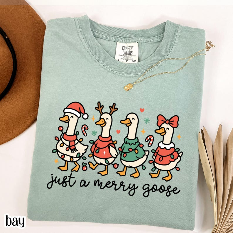 Christmas Comfort Colors Goose Shirt Funny Holiday Santa Lights Tshirt Festive Jolly Goose Tee Merry Christmas Shirt Just A Merry Goose Tee 1760516964638.png
