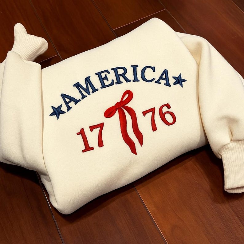 Embroidered Coquette Bow 1776 Crewneck Sweatshirt Cute America Independence Day 4th Of July Hoodie Patriotic Cute Sweater 4th Of July Sweatshirt 1760685017731.jpg
