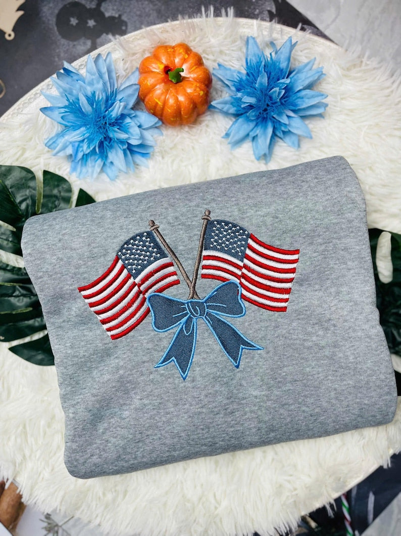 Patriotic Embroidered Sweatshirt With American Flags And Bow 4th Of July Gift Usa Flag Hoodie Independence Day Sweater 1760687036433.jpg