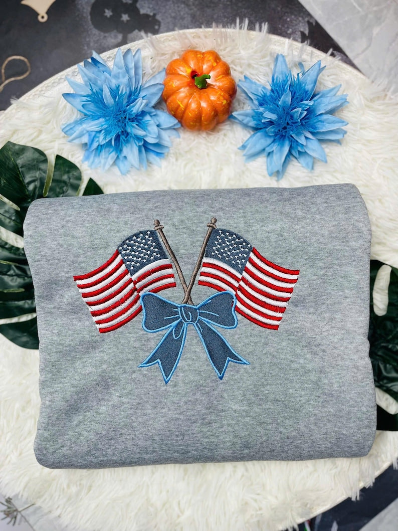 Patriotic Embroidered Sweatshirt With American Flags And Bow 4th Of July Gift Usa Flag Hoodie Independence Day Sweater 1760687036582.jpg