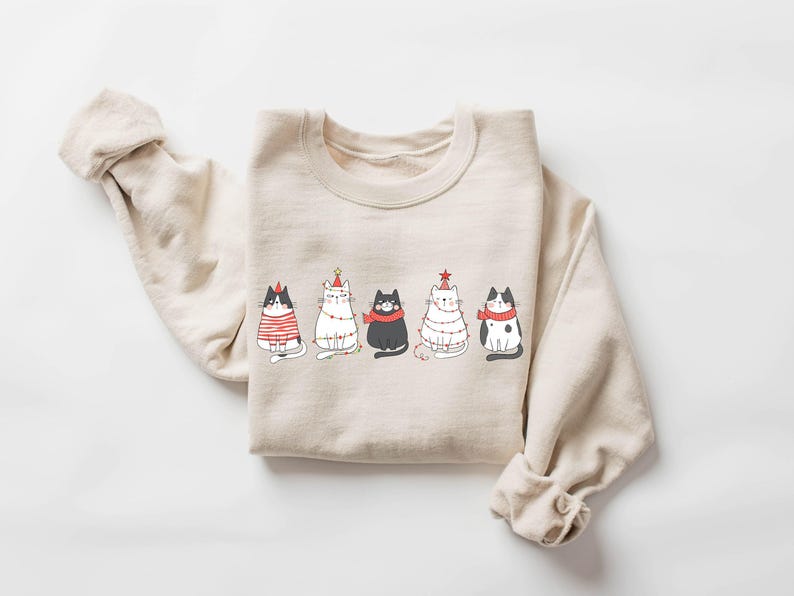Cute Cat Christmas Sweatshirt Cat Lover Gift For Christmas Womens Christmas Sweatshirt Holiday Sweatshirt Cat Mommy Shirt Winter Shirt 1761292816858.jpg