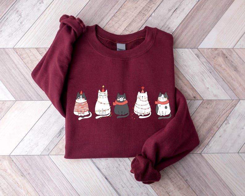 Cute Cat Christmas Sweatshirt Cat Lover Gift For Christmas Womens Christmas Sweatshirt Holiday Sweatshirt Cat Mommy Shirt Winter Shirt 1761292817562.jpg