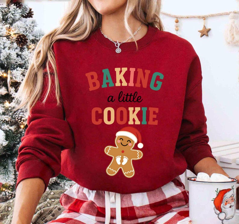 Growing A Little Cookie Sweatshirt Maternity Christmas Hoodie Christmas Pregnancy Announcement Shirt Funny Baby Reveal New Mom Gift 1761366650263.jpg