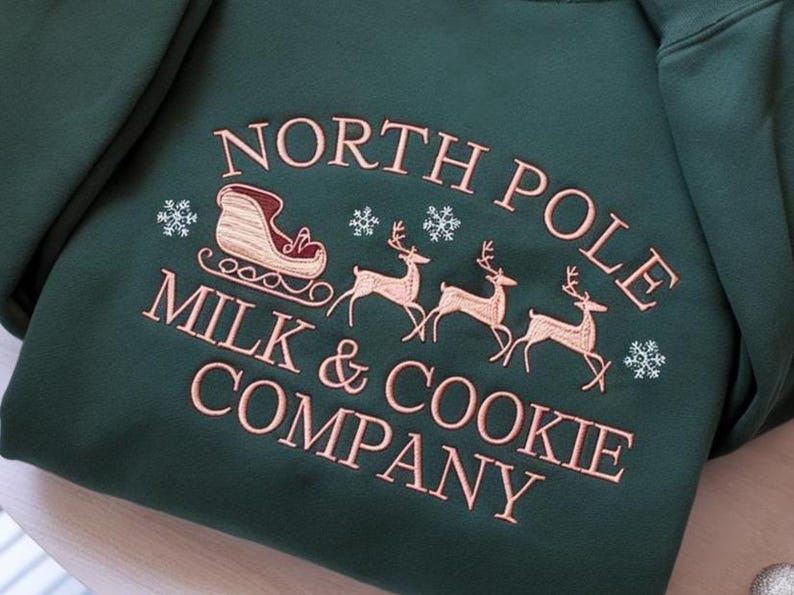 North Pole Milk And Cookie Co Embroidered Sweatshirt Holiday Sweatshirt Gingerbread Hoodie Christmas Cookie Sweater Christmas Hoodie 1761617707863.jpg