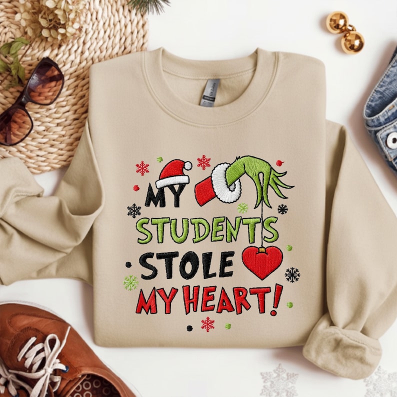 My Student Stole My Heart Embroidered Christmas Sweatshirt Funny Grinchmas Hoodie Christmas Gift Embroidered Teacher Sweater 1761882244468.jpg