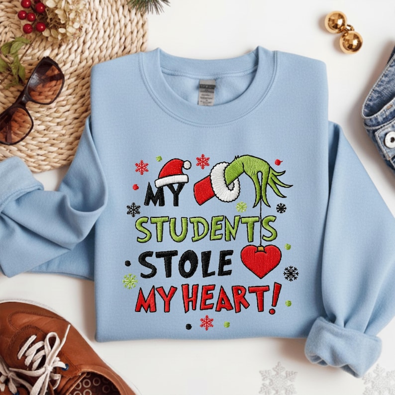 My Student Stole My Heart Embroidered Christmas Sweatshirt Funny Grinchmas Hoodie Christmas Gift Embroidered Teacher Sweater 1761882244486.jpg
