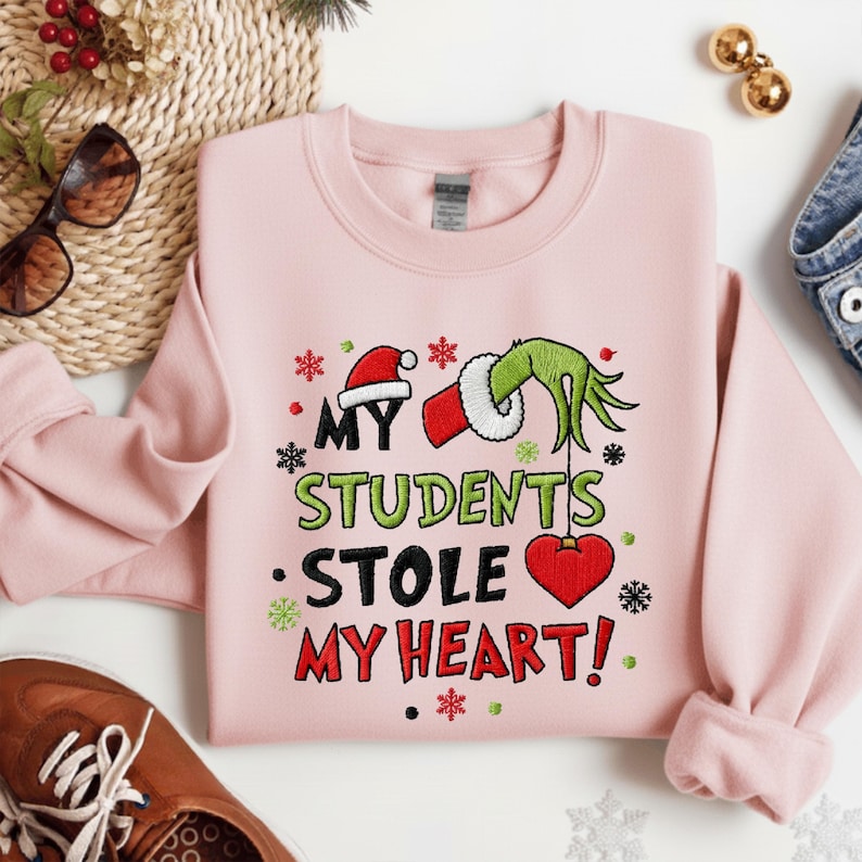 My Student Stole My Heart Embroidered Christmas Sweatshirt Funny Grinchmas Hoodie Christmas Gift Embroidered Teacher Sweater 1761882244522.jpg
